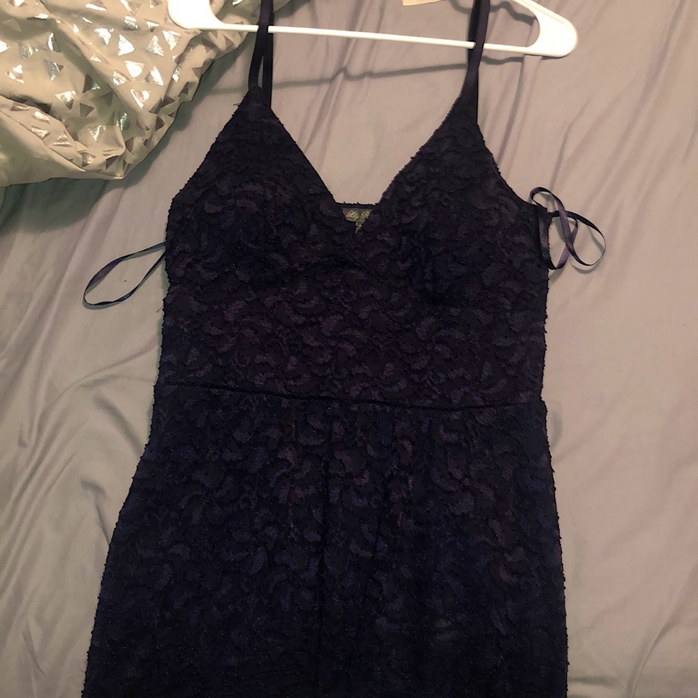 A blue mini dress, never worn, tight fit on me!